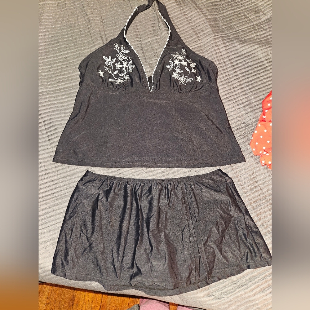 2 piece plus size swim set with tanking top and skirt bottom.